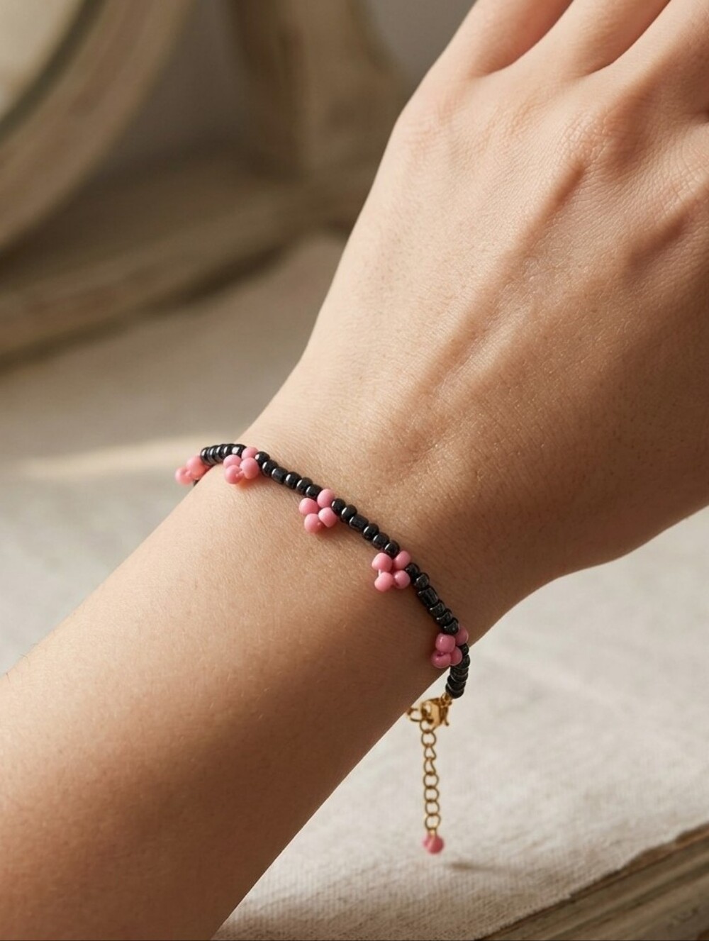 Handcrafted Glass Seed Bead Floral Bracelet In Black And Pink